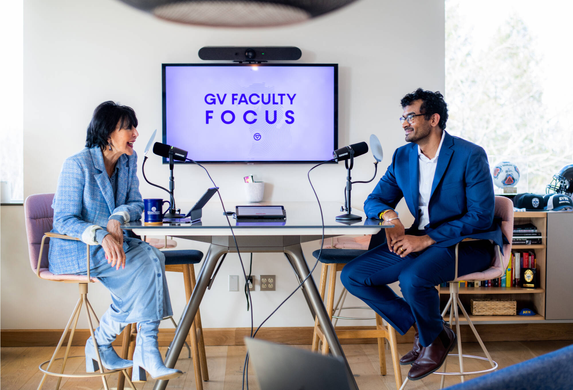 President Philomena V. Mantella talks with Sanjivan Manoharon, associate professor of mechanical engineering, during a recording of a Faculty Focus Podcast March 6.